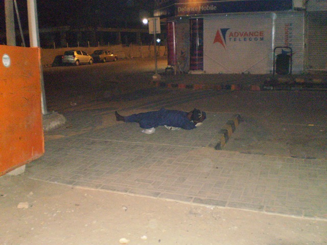 poor man sleeping at night