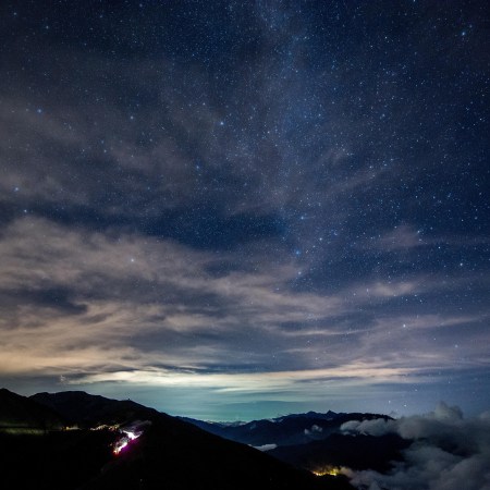 dark night sky with stars clouds and celestial bodies as mentioned in Surah Al-Mulk in the Qur’an