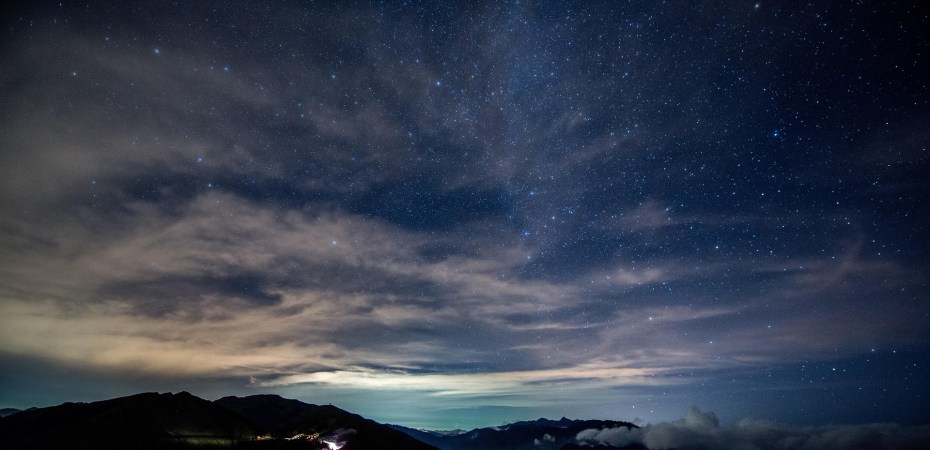dark night sky with stars clouds and celestial bodies as mentioned in Surah Al-Mulk in the Qur’an